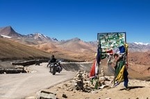 Bikers embarking on a journey through the stunning mountains Bikers embarking on a journey through the stunning mountains